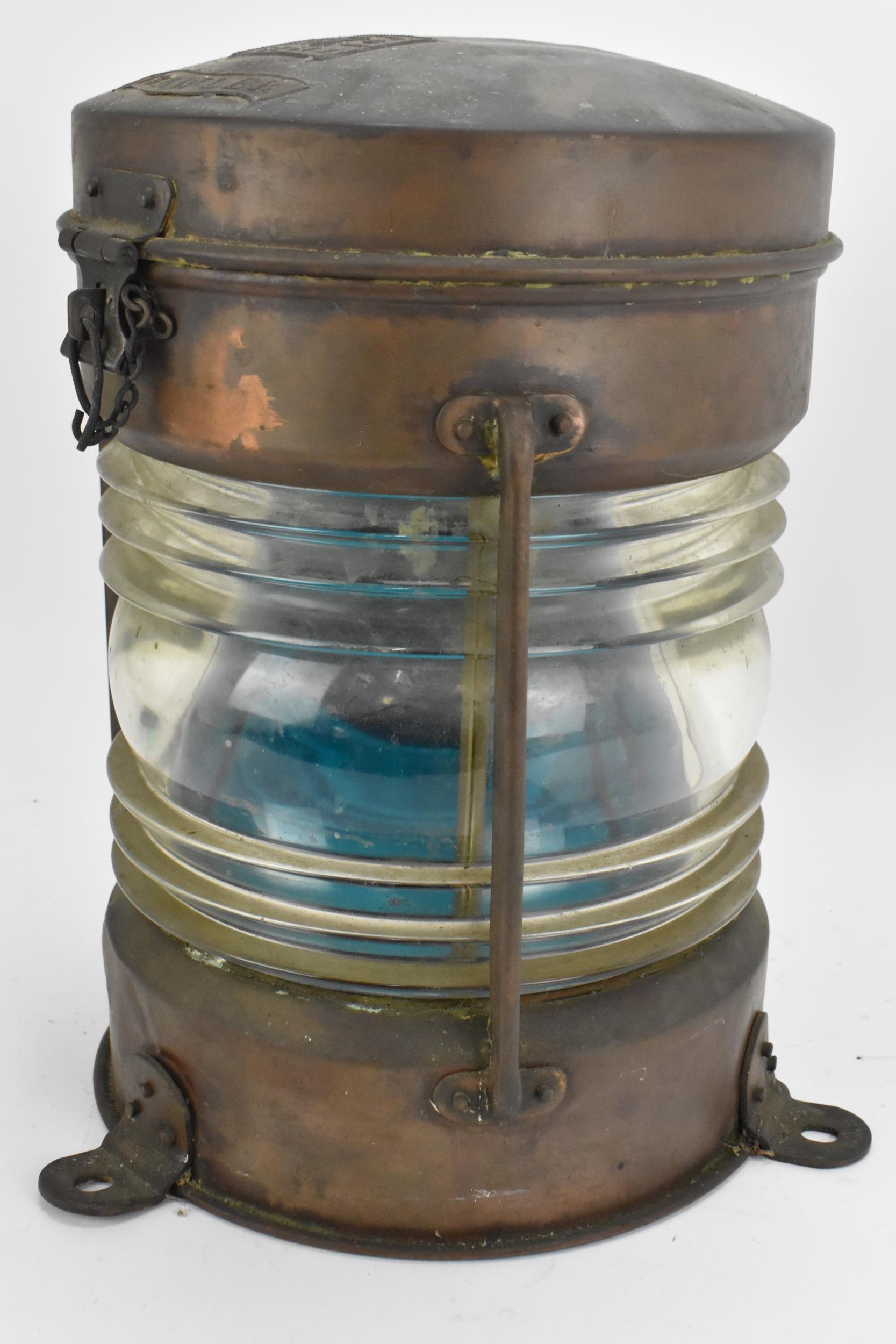 A copper and brass ship's lantern by Seahorse, no. 52672, 'Trawler', with blue glass, 35 cm high - Image 3 of 3