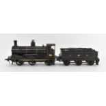 A clockwork gauge 1 0-4-2 locomotive and tender (CR) Caledonian Railway, possibly by Bing for