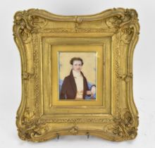 A 19th century portrait miniature on ivory of a gentleman, within a glazed giltwood moulded frame,