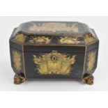 A 19th century Chinese black lacquered tea caddy, of sarcophagus form, with gilt chinoiserie