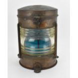 A copper and brass ship's lantern by Seahorse, no. 52672, 'Trawler', with blue glass, 35 cm high
