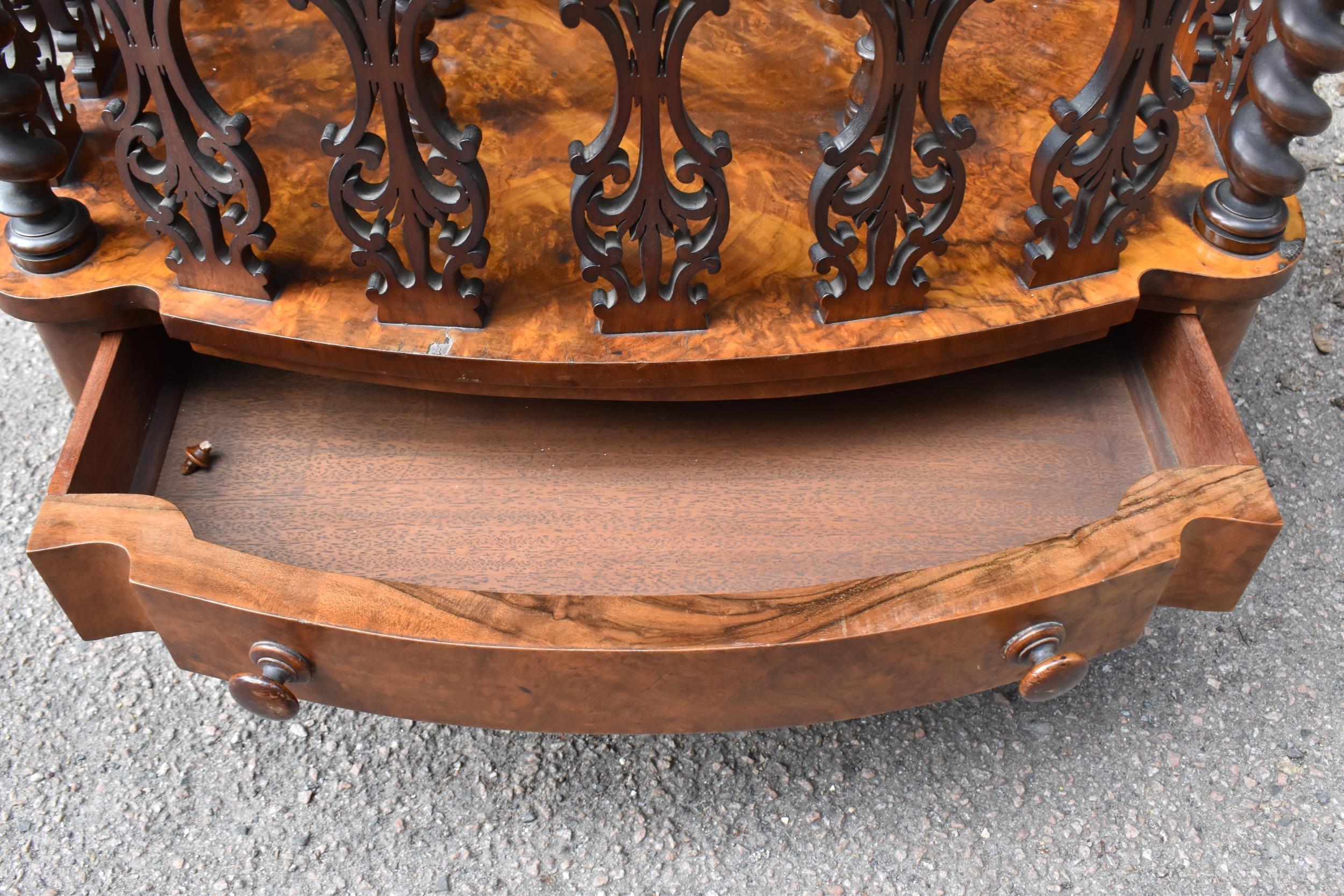 A Victorian figured walnut two division music canterbury, of oval outline, with a spindle and fret - Image 4 of 5