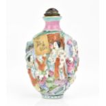 A Chinese molded Famille Rose porcelain snuff bottle, mid/late 19th century, Jingdezhen kilns,
