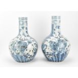 A large pair of Chinese blue and white tianqiuping vases, 19th century, late Qing dynasty, the