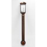 A George III mahogany and string inlaid stick barometer, the register plate signed P.G Tarone,