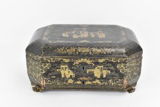 A Chinese black lacquer workbox / sewing box, 19th century, of octagonal form, the lid with