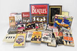 A collection of 'The Beatles' collector's ephemera, to include various books, tapes, VHS, calendars,