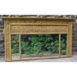 A Regency style giltwood overmantle mirror, late 19th century, the tripartite plate framed with