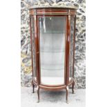 A French Louis XVI style vitrine, 20th century, of D-shape, the top with pierced gallery and