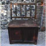 A Chinese Qing dynasty seat, 19th century, probably hongmu wood, with privacy compartment under