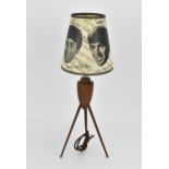 A vintage 'The Beatles' lampshade, in black and white paper printed with facial portraits of the