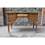 A French ormolu-mounted kingwood parquetry desk, 20th century, inspired by the 19th century French