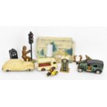 A Tri-Ang Minic clockwork tinplate Taxi, green body, black roof and chassis, white tyres, with