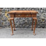 A George II style figured walnut card table, 19th century, the bookmatched veneer top with