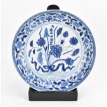 A Chinese blue and white porcelain dish, 19th century, Qing dynasty, of circular form, with