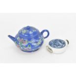 A Chinese enamelled Yixing (zisha) miniature teapot, 20th century, of squat form with blue ground