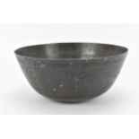 A Chinese Ming bronze singing or rituals bowl, 15th century, designed with engraved dragon and