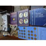A collection of British coinage and commemorative coins to include coin folders of pennies and