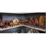 Wooden models and collectables to include a darter and fruit bowl with models of fruit, two fish and