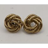 A pair of 9ct gold twisted knot earrings, total weight 4.1g Location: