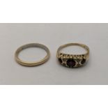 A 9ct gold ring set with pave stones together with a 9ct and platinum wedding band total weight 4.6g