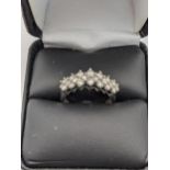 A 14ct white gold and diamond cluster ring A/F total weight 3.4g Location: