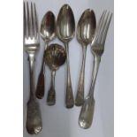 Georgian and later silver spoons and forks to include a caddy spoon, 256g Location: