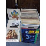 A collection of mainly 1950-70s LP records to include Dolly Parton, Johnny Cash and others.