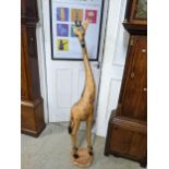 An African carved wooden model of a giraffe 153cm high A/F Location: