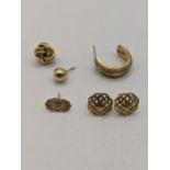 A mixed 9ct gold earrings to include a pair of seed of life style earrings and others, total