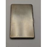 A silver engine turned cigarette case 192g Location: