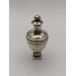 19th century urn form container, hinged lid with finial, gilded interior and standing on square