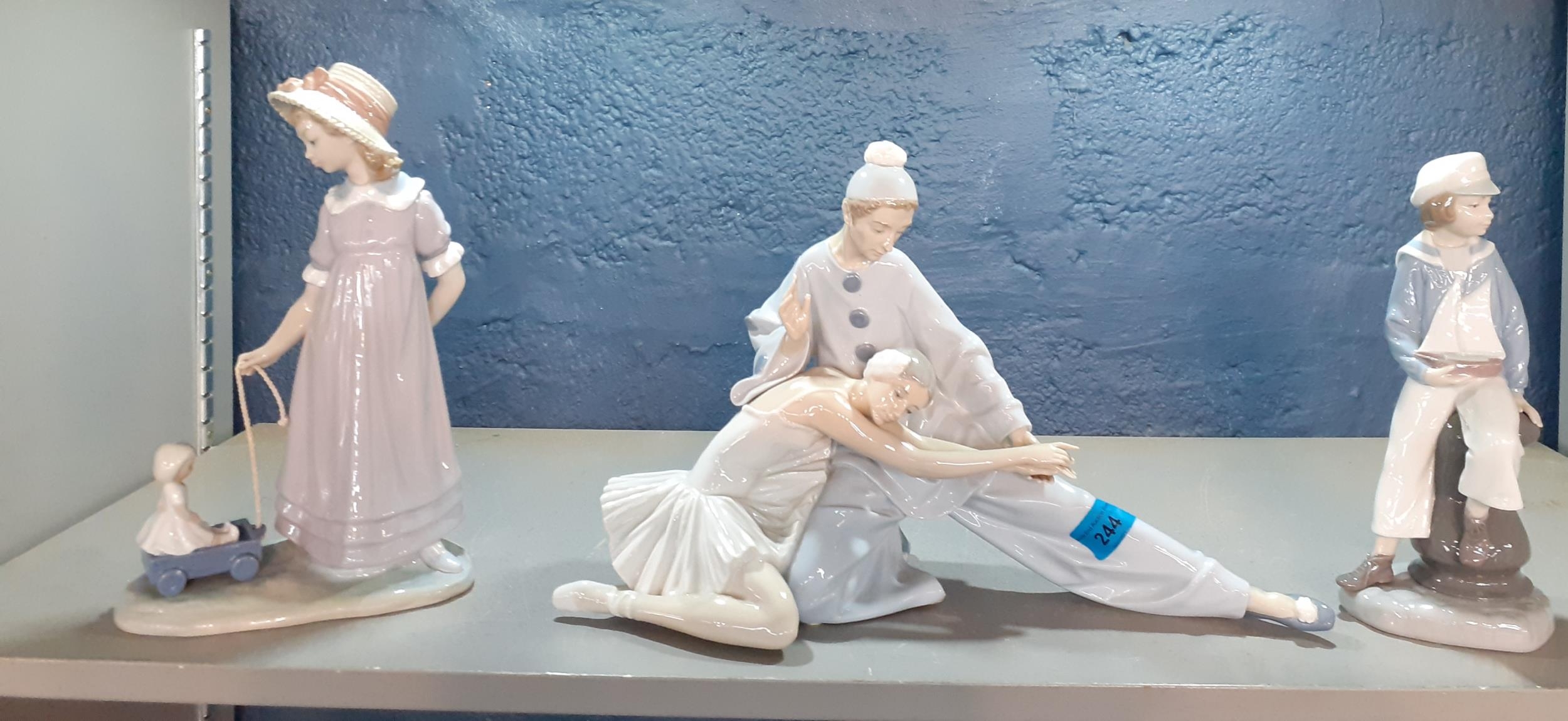 A Lladro figural group of a ballerina and a clown together with two other Lladro figures Location: