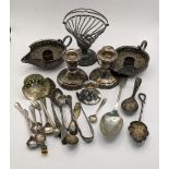 A mixed lot to include a silver candleholder, teaspoon and one other, together with white metal
