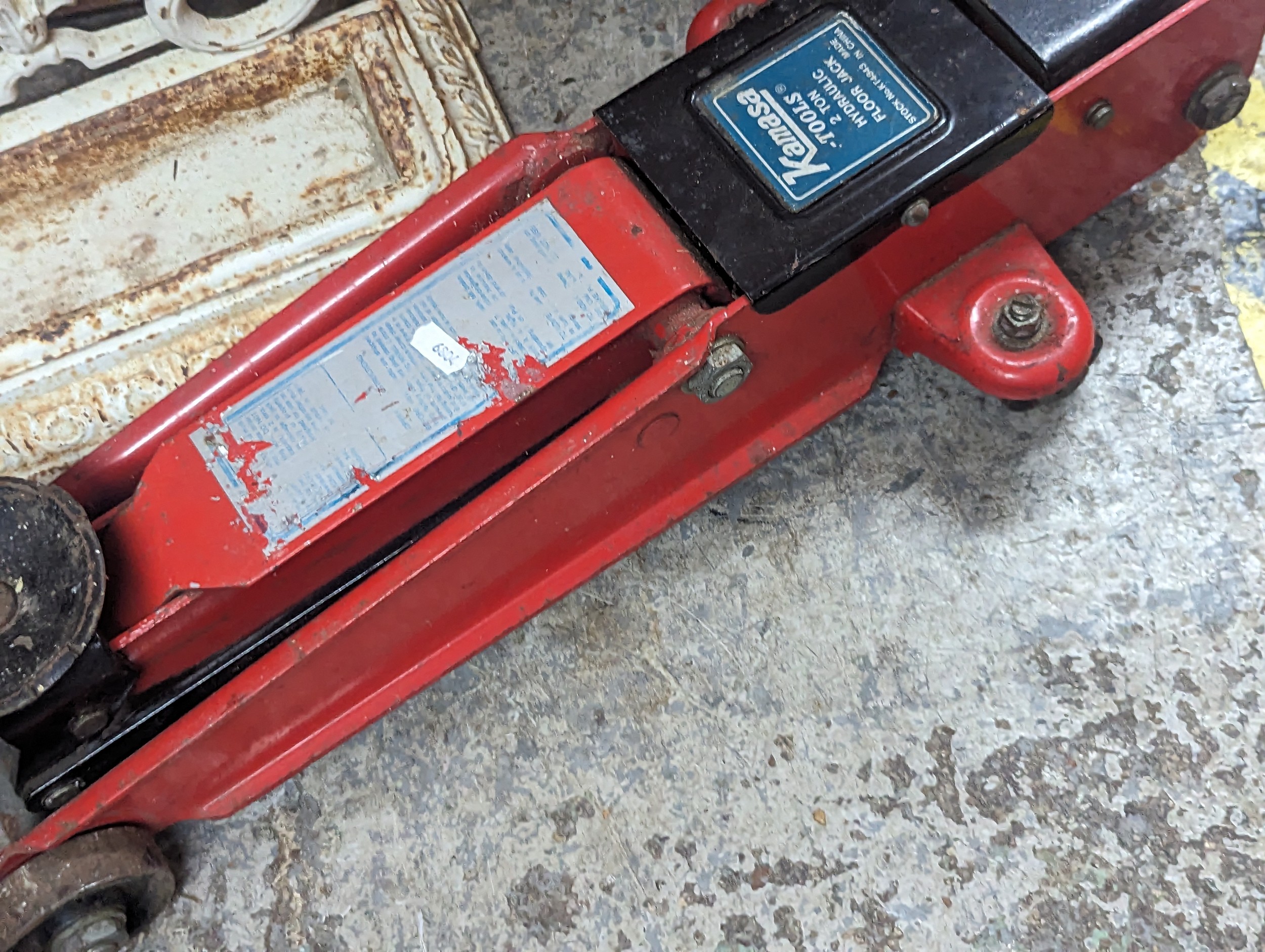 A mixed lot to include a white painted cast iron stick stand, vintage petrol can and a Kamasa car - Image 4 of 4