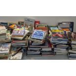 A large quantity of hardback books to include Botham's autobiography, John Surtees World Champion,