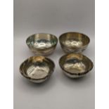 Two silver bowls stamped silver to the bottom, together with two white metal continental bowls total