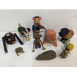 A selection of clockwork toys to include a Schuco pig playing a violin, Schuco dancing mouse and