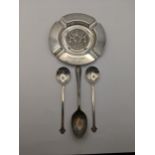 A silver commemorative plate and three silver spoons 198g Location: