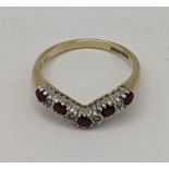 A 9ct wishbone diamond and ruby ring , total weight 2.5g Location: