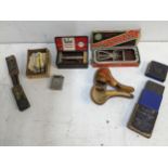 A mixed lot of shaving and smoking memorabilia to include a silver plated Dunhill lighter, a leather