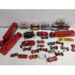 Diecast model vehicles to include Ferrari transport lorries, Brunn examples and racing cars.