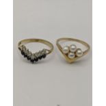 Two 9ct gold wishbone style rings, one set with pearls, the other set with pace stones and sapphires