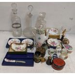 A mixed lot to include a boxed Royal Crown Derby, cut glass decanters, papiermache trinket boxes and