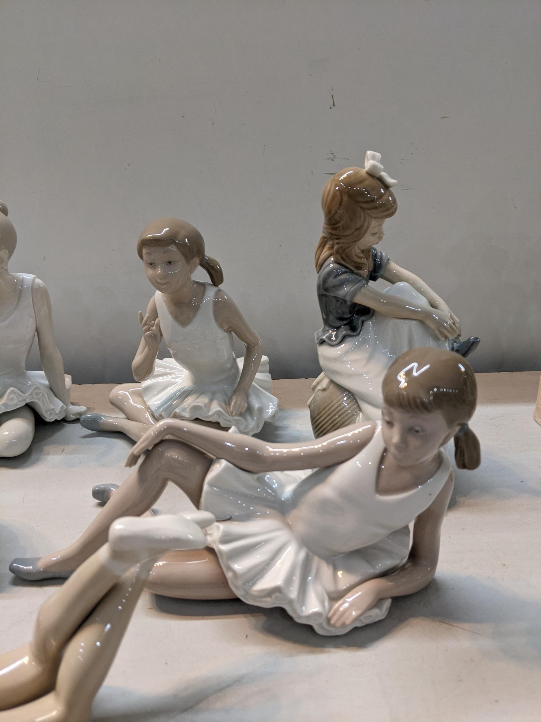 A quantity of Nao ballerina figurines, together with two other Nao figurines Location: - Image 2 of 4