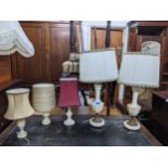 A selection of lamps to include a pair of white onyx and gilt metal lamps with fabric shades,