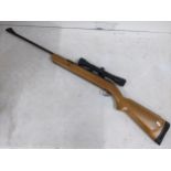 A BSA Airsport rifle with a Bisley scope Location: