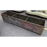 A 19th century galvanised garden trough having ring handles and metal bound studs, 45.5cm h x