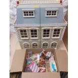 Circa 2000, a Sylvanian Families doll's house with accessories and doll's house furniture (not all