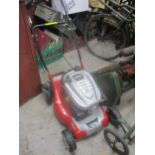 A Cobra DG450v lawnmower Location: